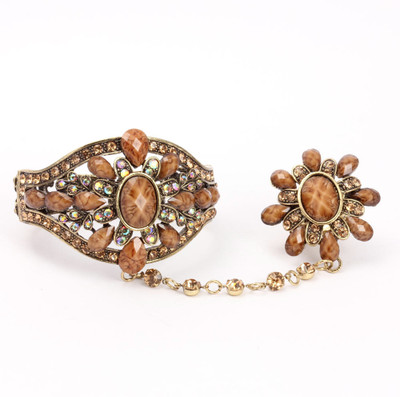 30% OFF on KhoobSurati Classy Stone And Embossed Metal Ring Bracelet