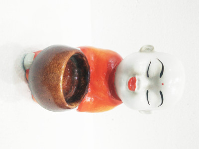 24% OFF on Earth Standing Monk Polyresin 1 - Cup Tealight Holder Orange, White, Pack of 1