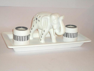 27% OFF on Eventz Gifts Wooden 4 - Cup Tealight Holder Set White, Pack of 4 27% OFF on Eventz Gifts Wooden 4 - Cup Tealight Holder Set White, Pack of 4