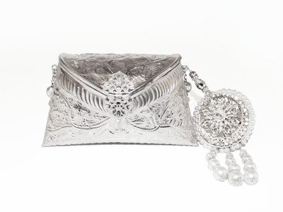 10% OFF on Ruhmet Embossed Silver With Lasel Cut Pearl Detail Tassel Women Casual, Party, Wedding Silver Metal Clutch 10% OFF on Ruhmet Embossed Silver With Lasel Cut Pearl Detail Tassel Women Casual, Party, Wedding Silver Metal Clutch