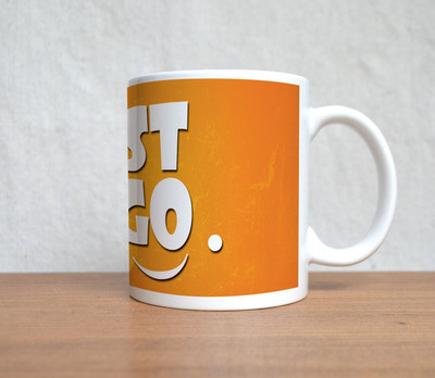 60% OFF on StyBuzz Just Let Go Orange Porcelain Mug 300 ml