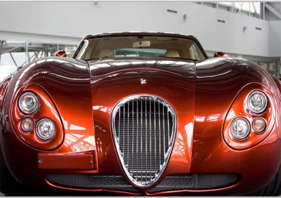 75% OFF on Shining Red Car Poster (18 x 12 Inches) by Shopkeeda Paper Print