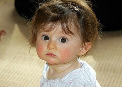 40% OFF on Sweet Little Baby With Chubby Cheek Paper Print