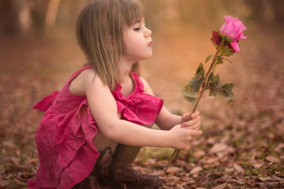 50% OFF on Baby Girl With Red Rose Poster Paper Print