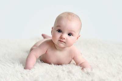 31% OFF on Child'S Love - Cute Baby On A White Fur Paper Print