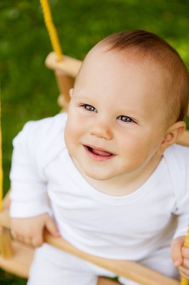 16% OFF on Cute Smiling Baby With Sparkling Eyes Poster Paper Print