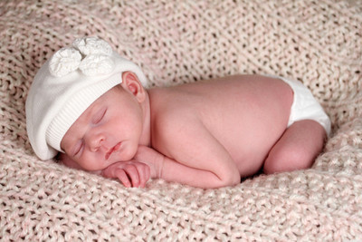 31% OFF on Child's Love - Sleeping Baby on a Wollen Couch Paper Print