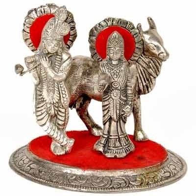 46% OFF on Shoppingatara White Metal Lord Radha Krishna Idol with Cow Showpiece - 10 cm