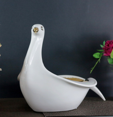 25% OFF on Importwala Ceramic Bird Sculpture Showpiece - 22 cm 25% OFF on Importwala Ceramic Bird Sculpture Showpiece - 22 cm