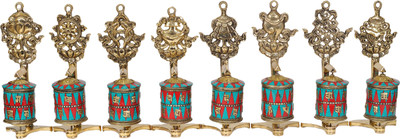 20% OFF on Exotic India Set of Eight Ashtamangala Prayer Wheels Showpiece - 19 cm 20% OFF on Exotic India Set of Eight Ashtamangala Prayer Wheels Showpiece - 19 cm