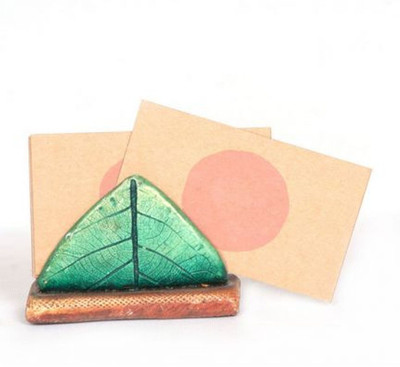 9% OFF on Earth Tabletop of Leaf Card Holder Showpiece - 6.35 cm 9% OFF on Earth Tabletop of Leaf Card Holder Showpiece - 6.35 cm